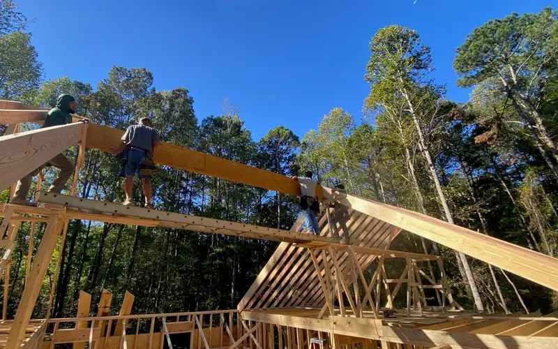 Roberto García's crew setting roof framing on a home build near Hixson, TN